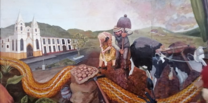 Parte del mural 'Sintiendo mi Suba', en donde aparecen dos subanos trabajando la tierra